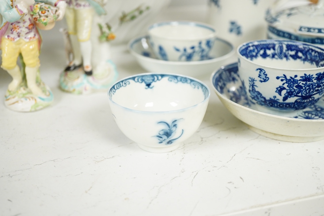 18th century mixed Worcester etc, including blue and white tableware together with two figurines etc, teapot, 13cm high (13).
